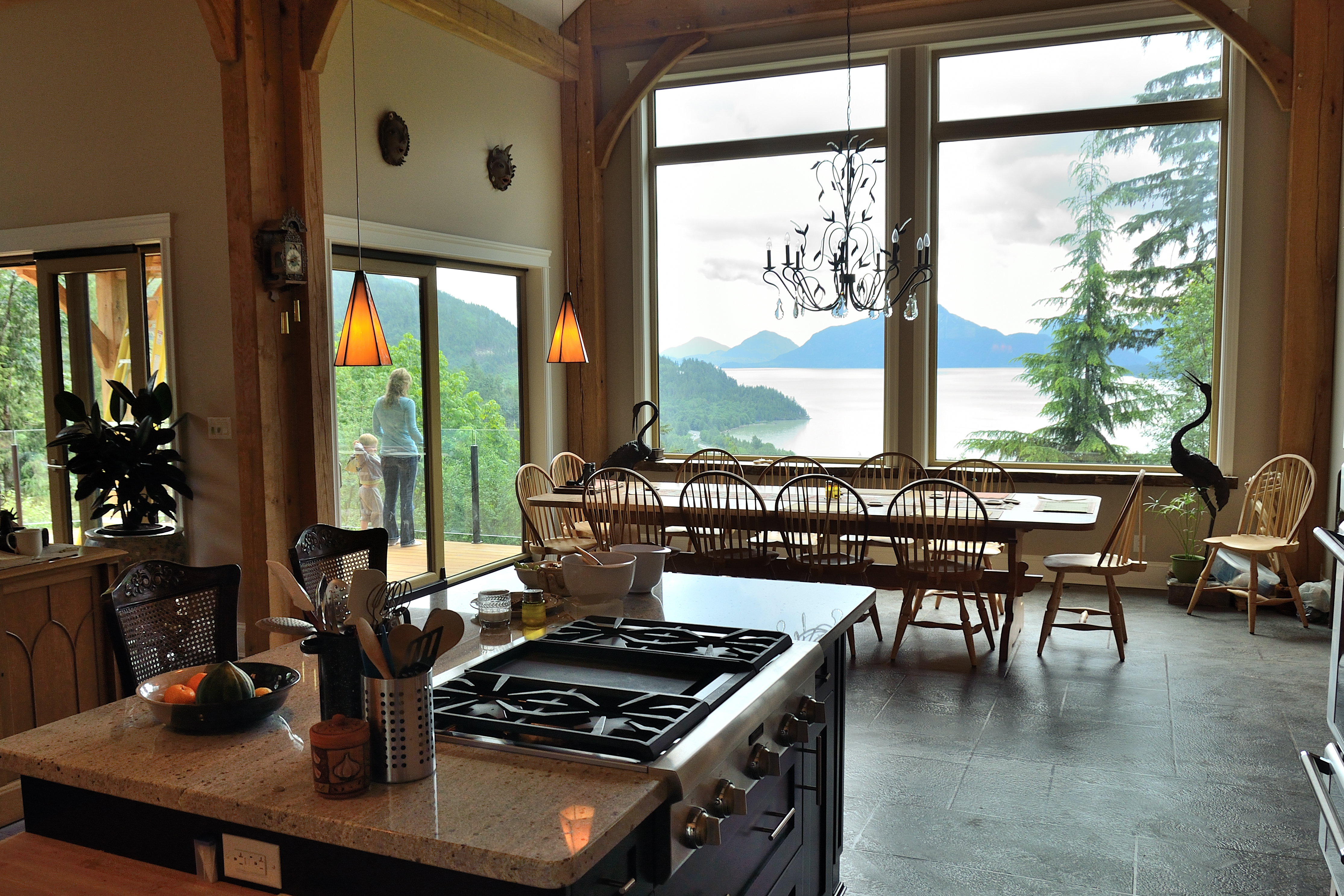 Timber-frame kitchen dining area with StoneCraft slate flooring