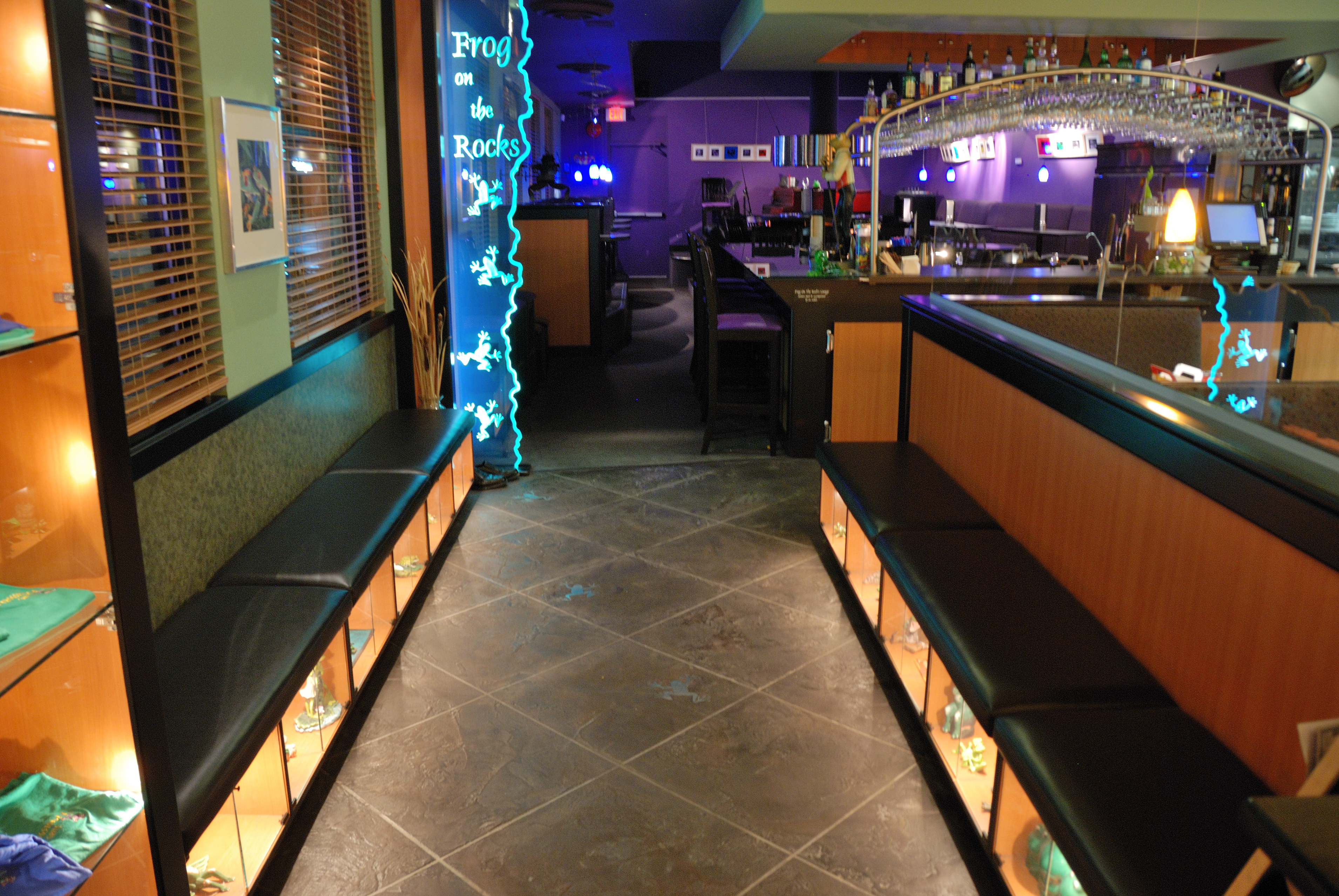 Nightclub interior with dark StoneCraft slate flooring and neon lighting