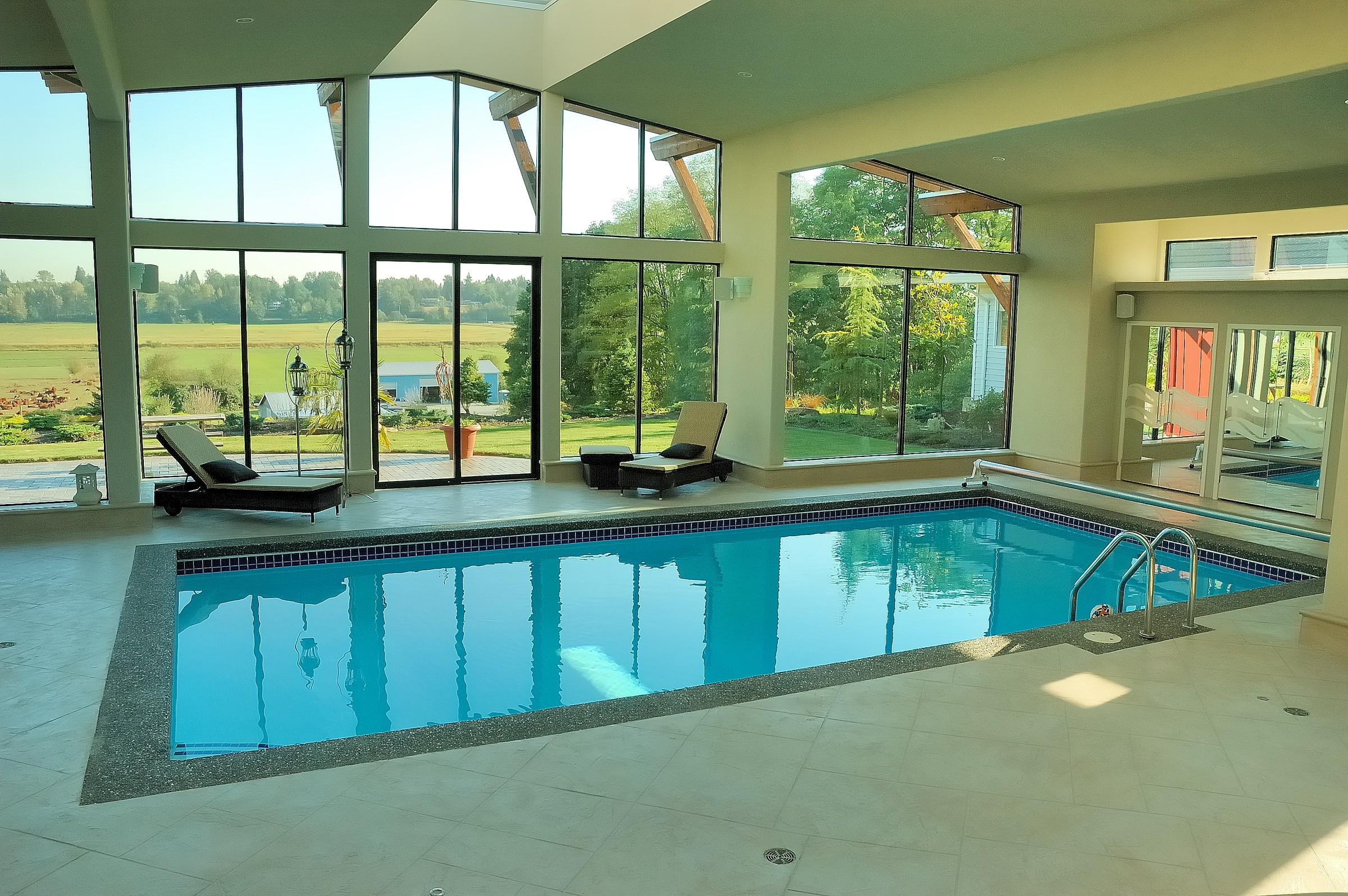 Indoor luxury pool with StoneCraft chemical-resistant surface
