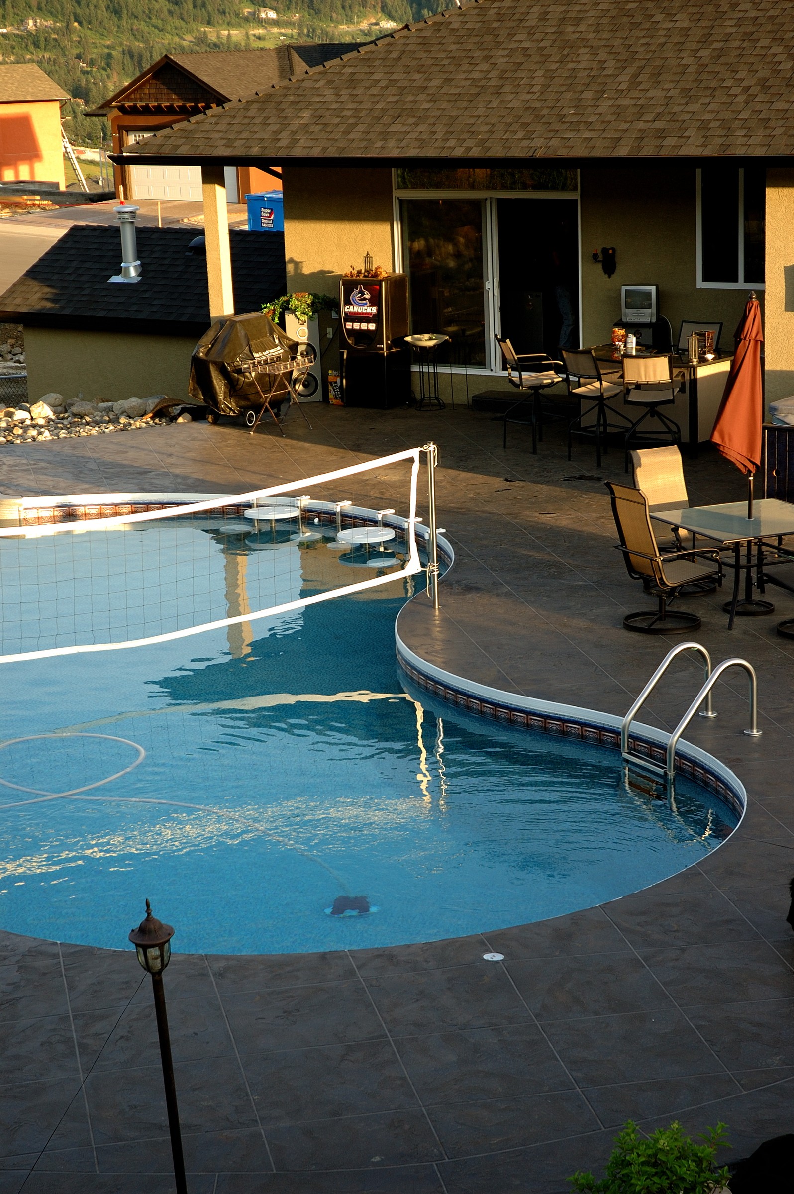 Curved pool deck with textured StoneCraft slip-resistant surface